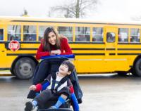 Mom with child in wheel chair