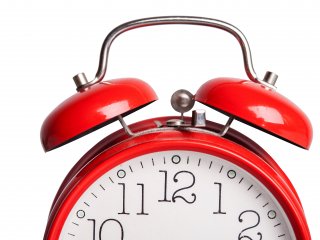 Image of a red alarm clock